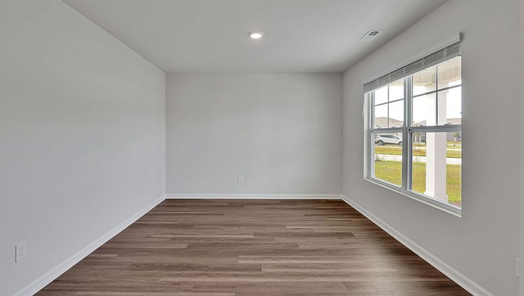 Representative unfurnished interior of a home built from the Hayden by D.R. Horton in Cedar Hill Landing, Navassa (Image 19).