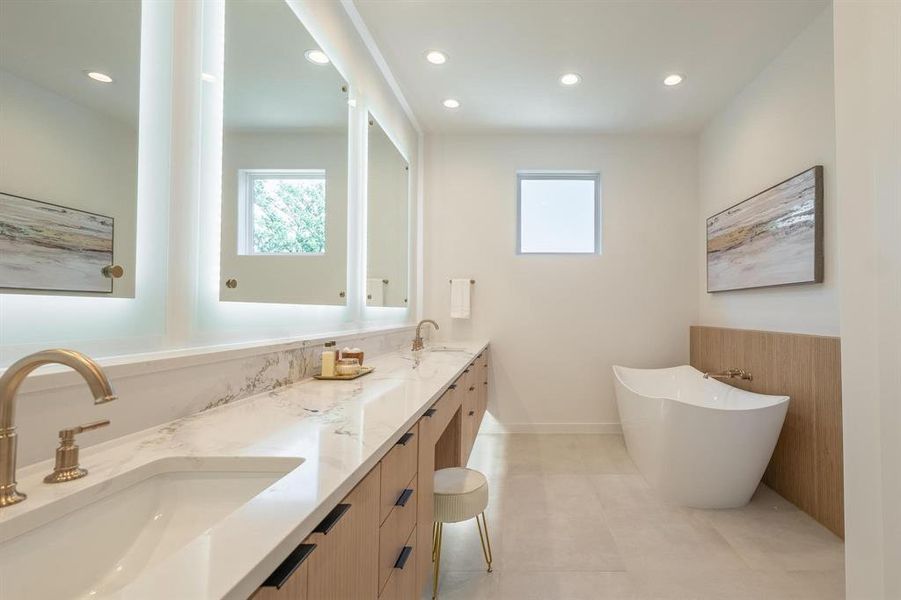 Master bathroom with soaking tub and double vanities