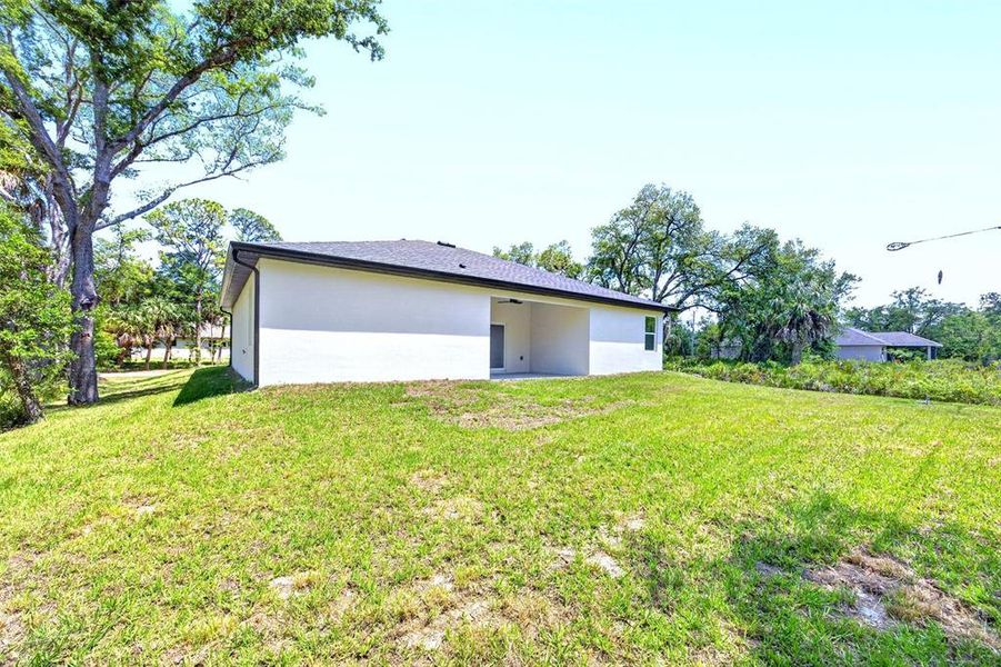 Exterior details and patio area of a home in , Port Charlotte (Image 3).
