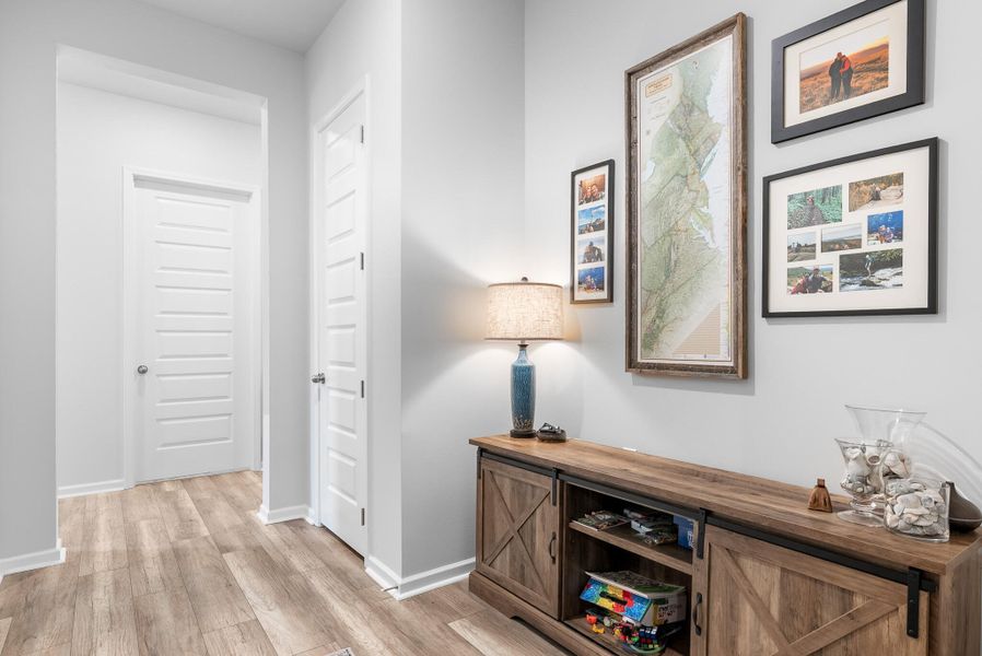 Furnished interior view inside a new home in Horizons at Summers Corner | 55+: The Estates, Summerville (Image 42).