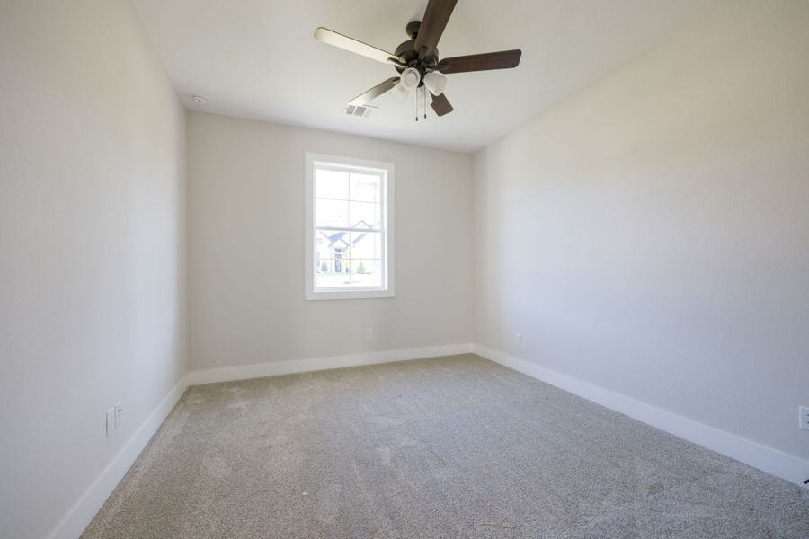 Representative unfurnished interior of a home built from the The Ellen II by Reece Homes in Pebble Creek, College Station (Image 64).