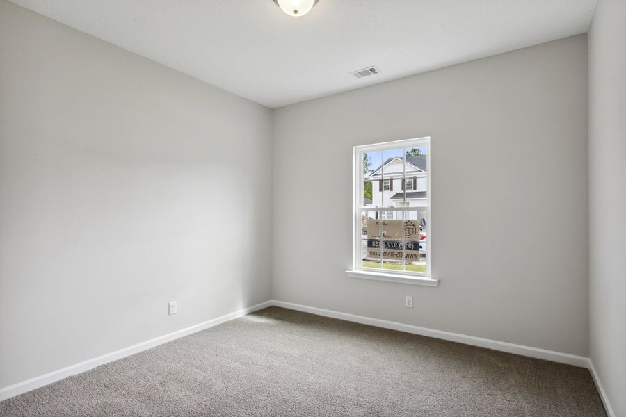 Representative unfurnished interior of a home built from the The Stafford by RTS Homes in Doctor's Creek, Ludowici (Image 43).