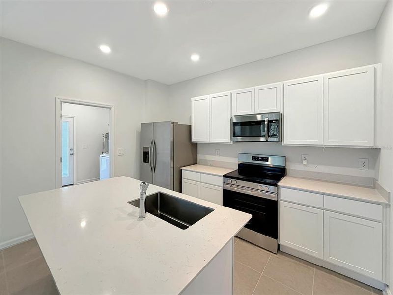 Furnished interior view inside a new home in , Apopka (Image 5).