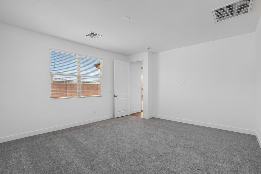 Spacious, unfurnished interior of a new home in Artisan at Asante, Surprise (Image 17).