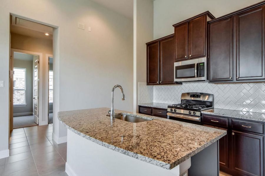 Representative furnished interior of a home built from the Oaks 1933 by Brohn Homes in Oaks at San Gabriel, Georgetown (Image 5).