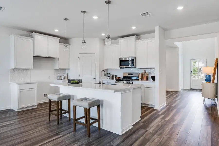 Representative furnished interior of a home built from the Wren by Taylor Morrison in Emory Crossing 50s, Hutto (Image 3).