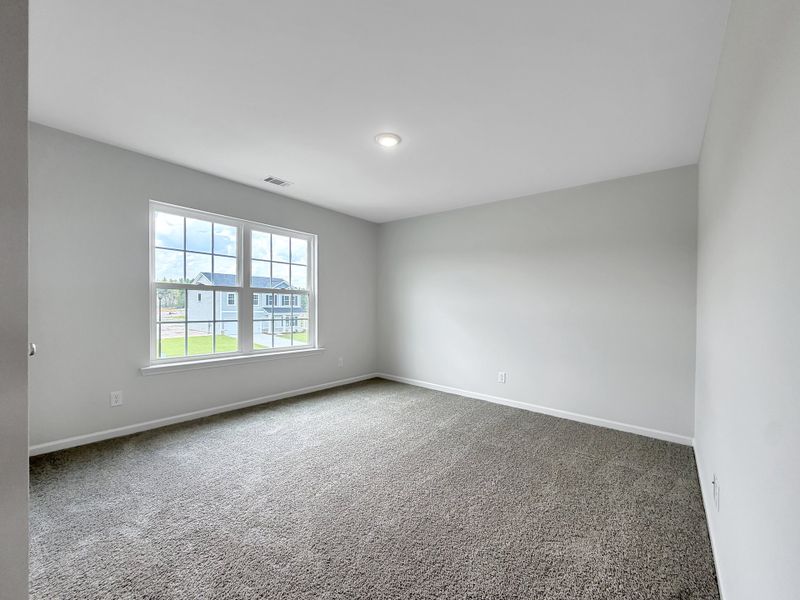 Spacious, unfurnished interior of a new home in Doctor's Creek, Ludowici (Image 13).