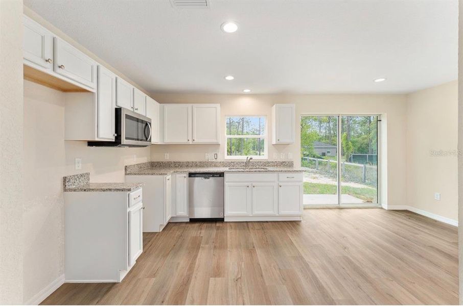 Furnished interior view inside a new home in , Dunnellon (Image 4).