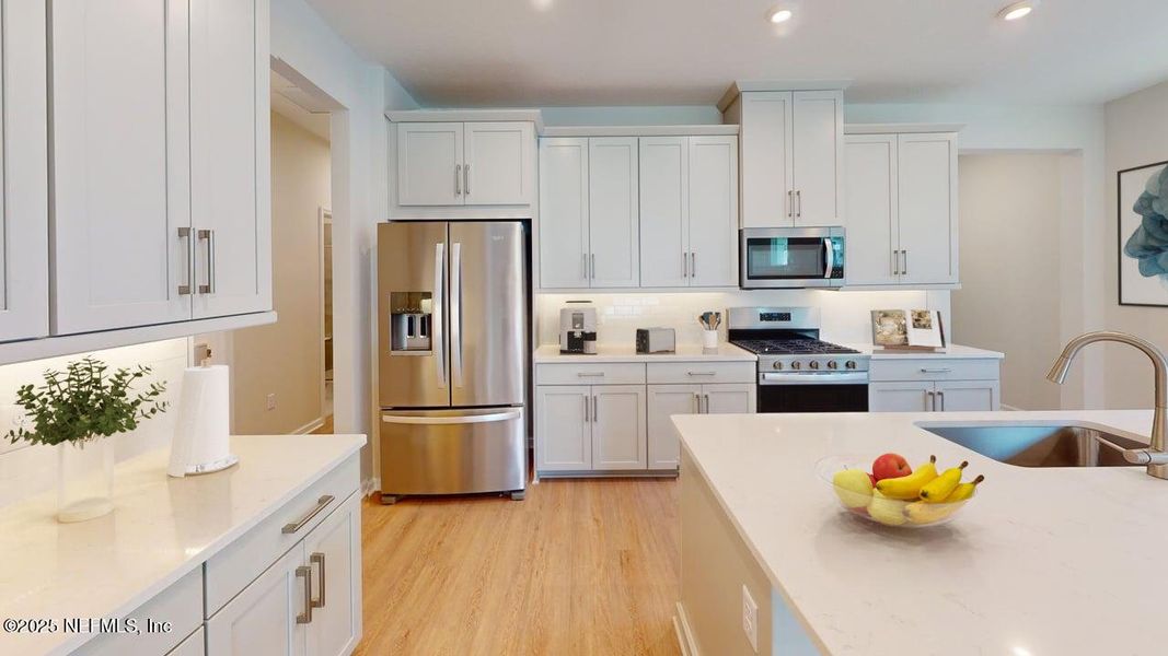 Furnished interior view inside a new home in RiverTown - WaterSong, St. Johns (Image 4). Furnished interior view inside a new home in RiverTown - WaterSong, St. Johns (Image 4).