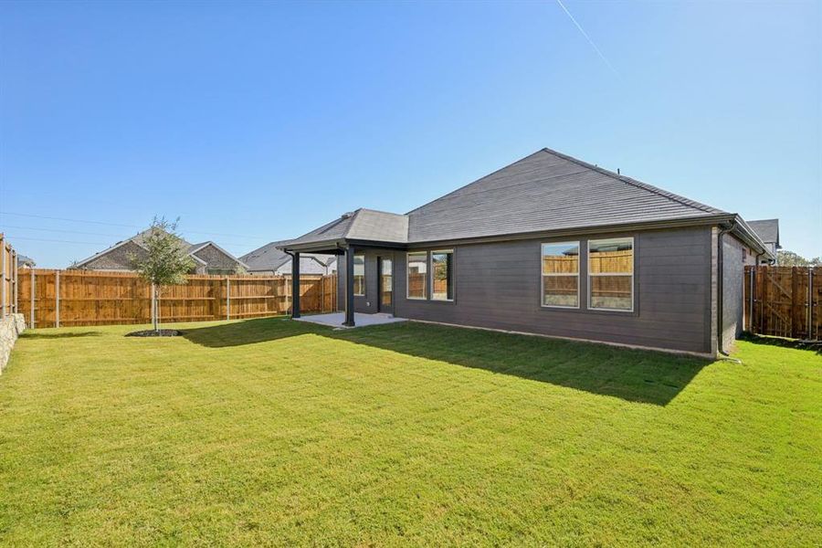 Exterior details and patio area of a home in Westmoor, Sherman (Image 2). Exterior details and patio area of a home in Westmoor, Sherman (Image 2).