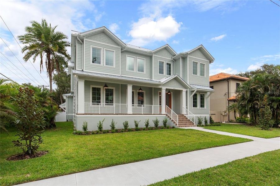 Front exterior of a new home in , Tampa, FL, highlighting curb appeal (Image 1). Front exterior of a new home in , Tampa, FL, highlighting curb appeal (Image 1).