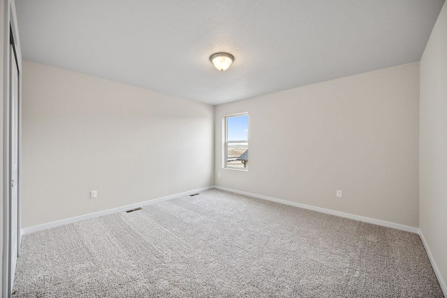 Spacious, unfurnished interior of a new home in Ridge at Lorson Ranch, Colorado Springs (Image 22).