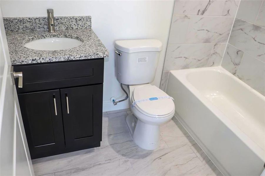 Furnished interior view inside a new home in , Citrus Springs (Image 9).