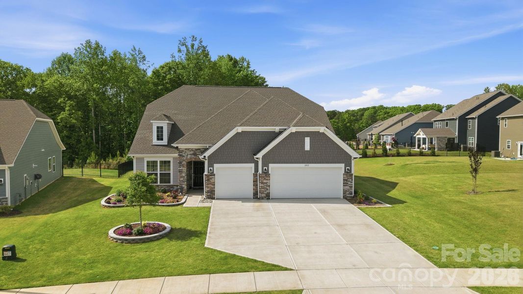 Front exterior of a new home in Harris Mill, Indian Land, SC, highlighting curb appeal (Image 2).