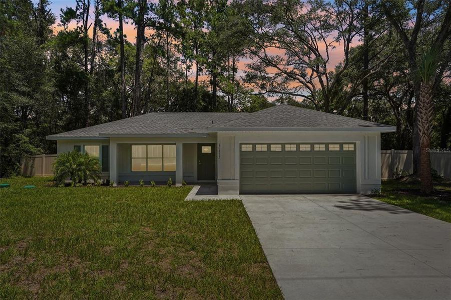 Front exterior of a new home in , Citrus Springs, FL, highlighting curb appeal (Image 26). Front exterior of a new home in , Citrus Springs, FL, highlighting curb appeal (Image 26).