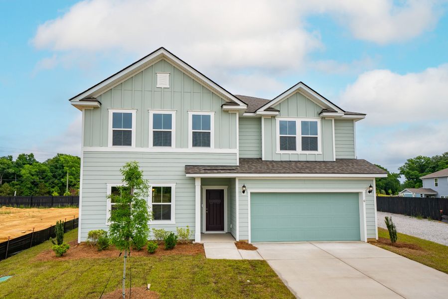 Front exterior of a new home in Monroe Preserve, Chapin, SC, highlighting curb appeal (Image 23).