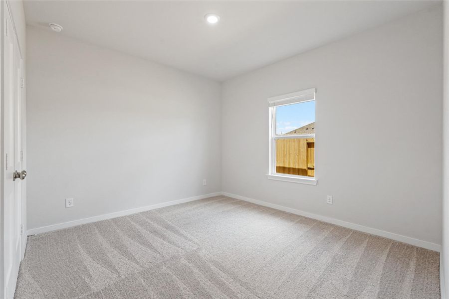Spacious, unfurnished interior of a new home in Sunterra, Katy (Image 14).
