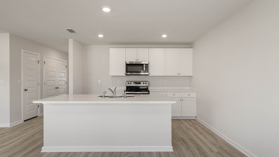 Furnished interior view inside a new home in Magnolia at the Bluffs Phase 3, Freeport (Image 3).