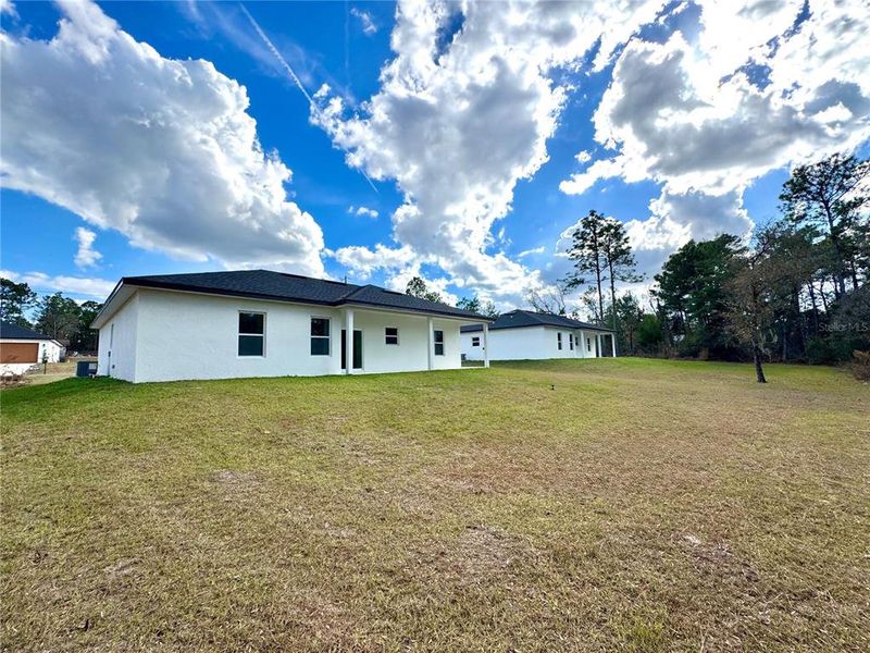 Exterior details and patio area of a home in , Citrus Springs (Image 18).