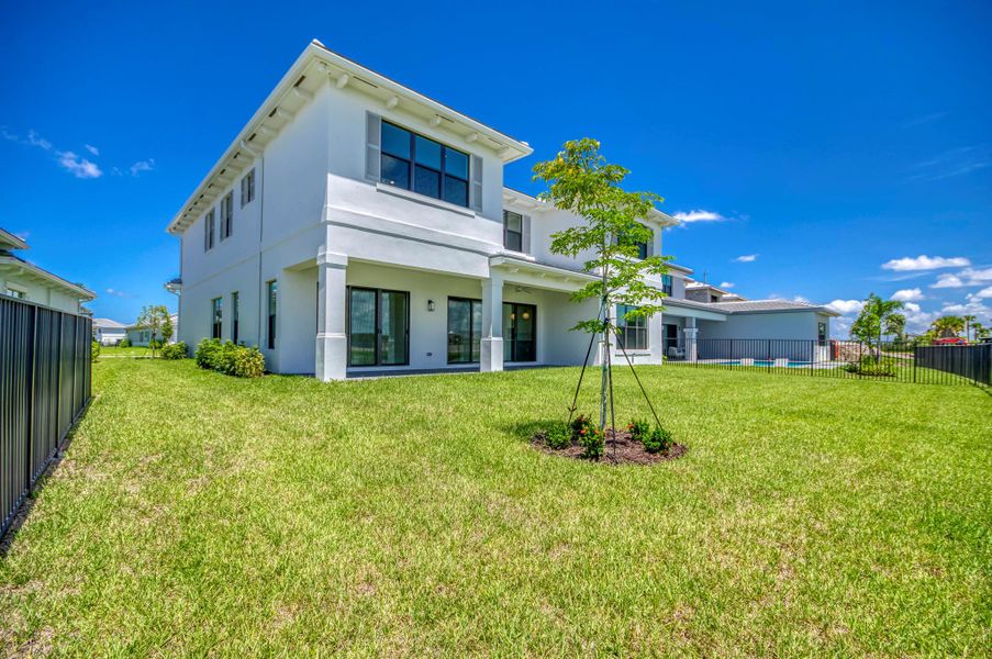 Exterior details and patio area of a home in Apex at Avenir, Palm Beach Gardens (Image 3).