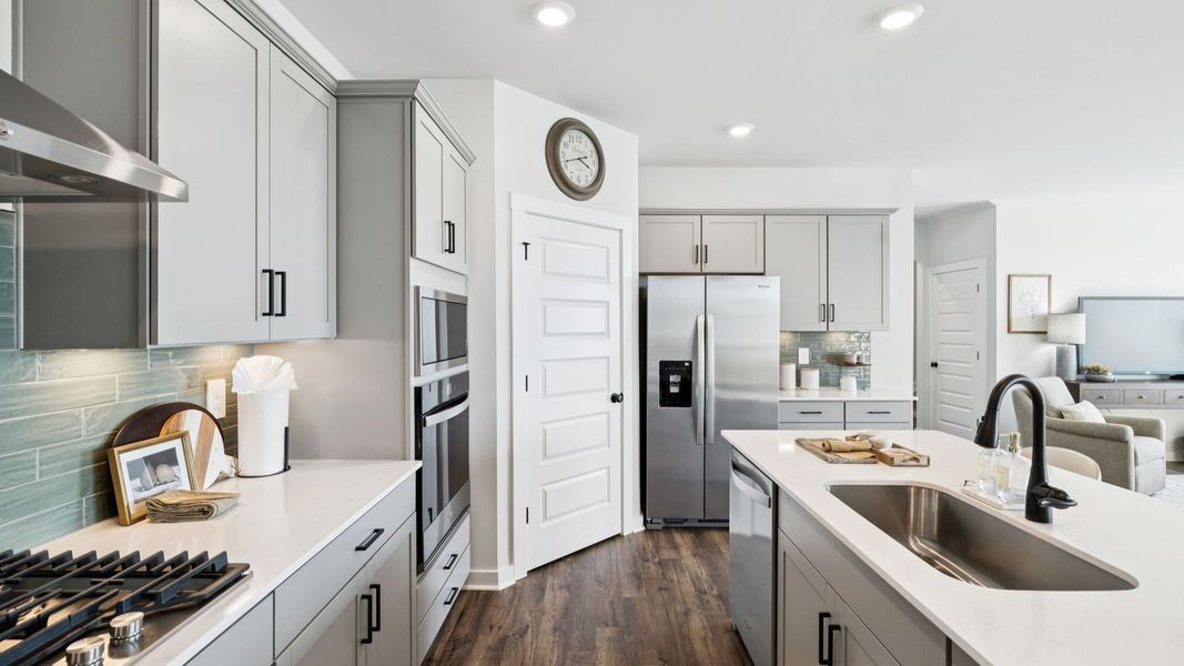 Representative furnished interior of a home built from the IRWIN A by D.R. Horton in Harvest Point, Spring Hill (Image 20).
