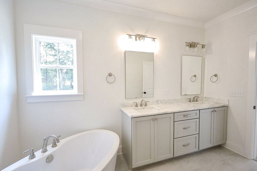 Furnished interior view inside a new home in Baker Road, Birchwood (Image 11).