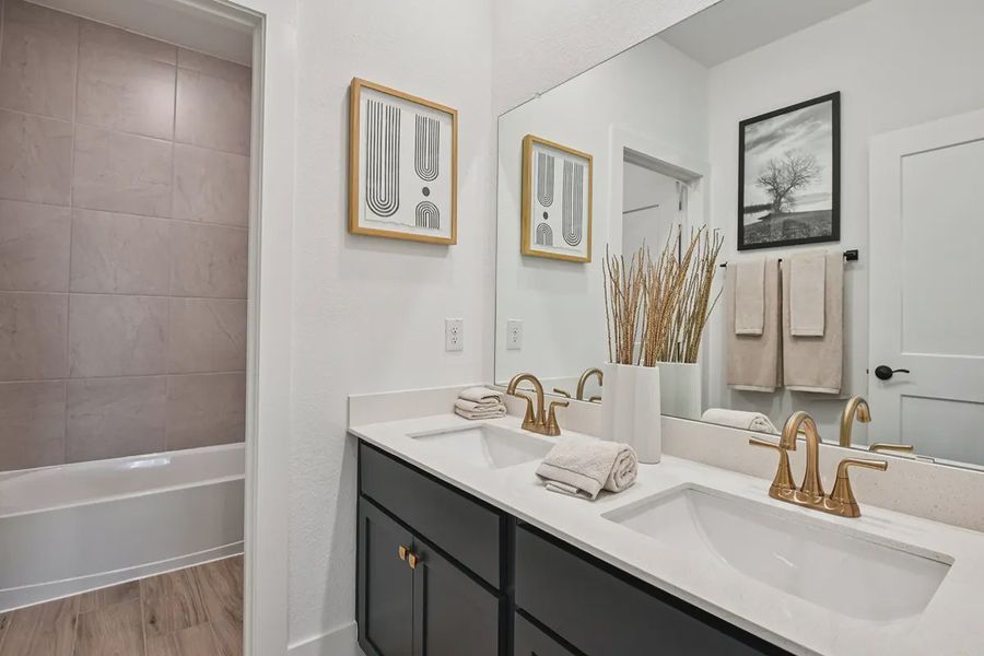 Furnished interior view inside a new home in Meridiana Chateau, Manvel (Image 5).