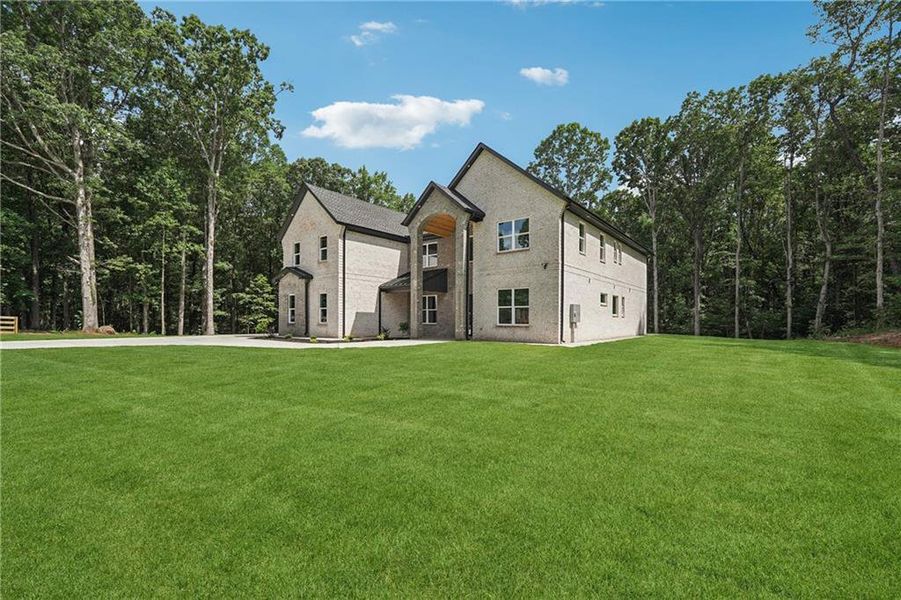 Front exterior of a new home in , Commerce, GA, highlighting curb appeal (Image 26).