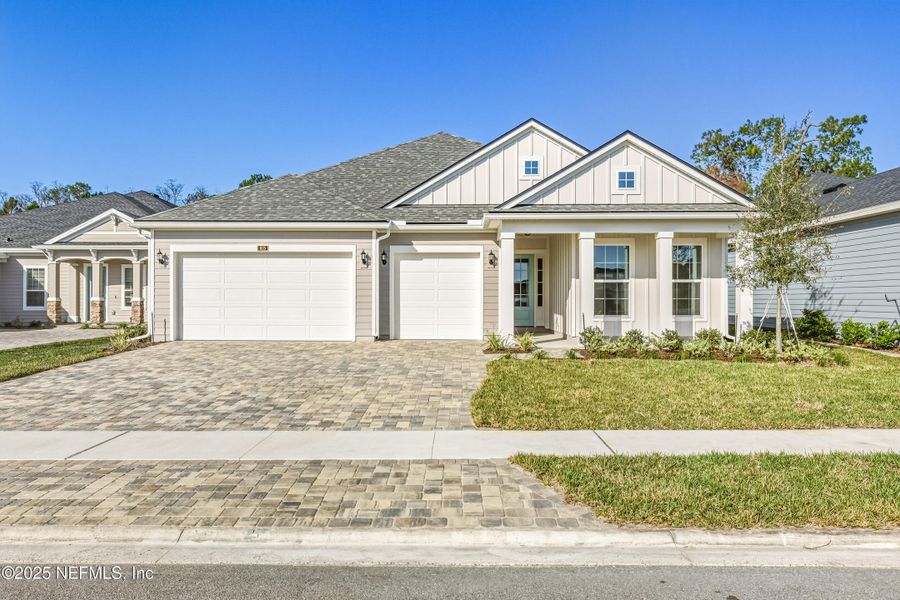 Front exterior of a new home in Silver Landing at SilverLeaf, St. Augustine, FL, highlighting curb appeal (Image 27).