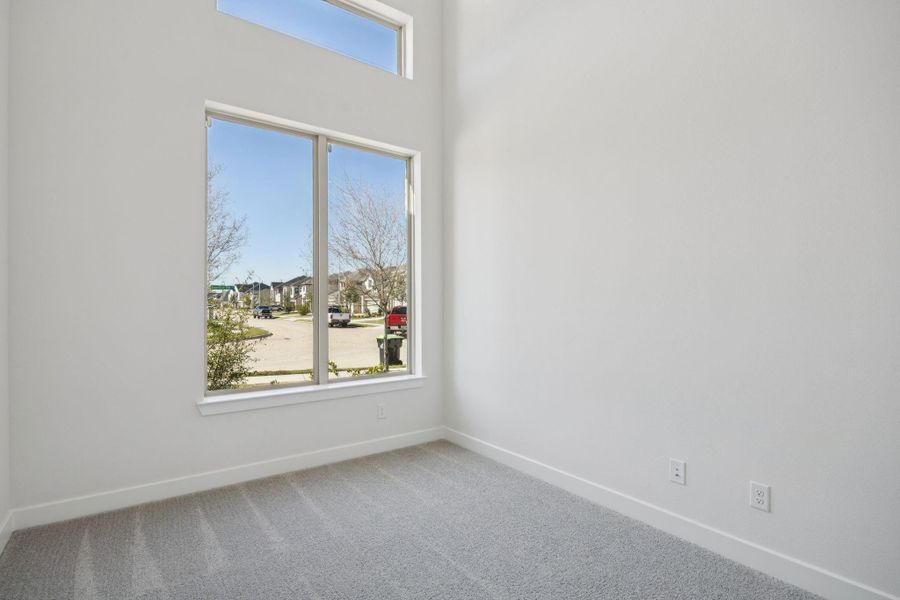 The home office is located just off the entry, features French doors and an incredible amount of natural light from a striking, multi-tiered wall of windows. The home office is located just off the entry, features French doors and an incredible amount of natural light from a striking, multi-tiered wall of windows.