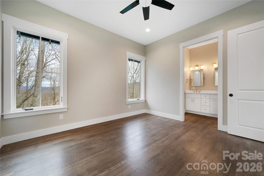 Spacious, unfurnished interior of a new home in , Pisgah Forest (Image 34).