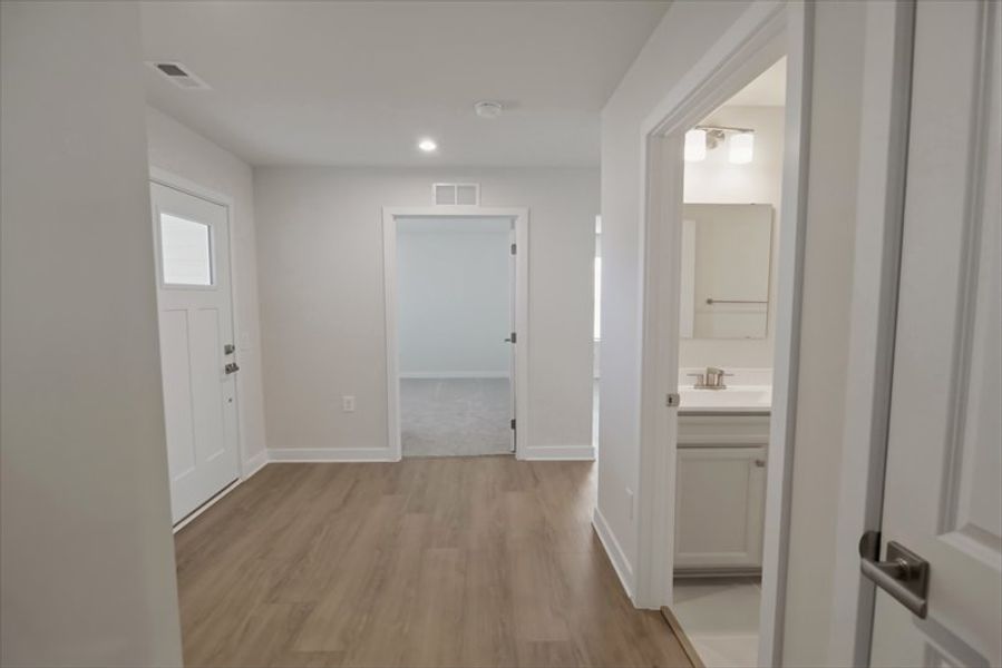 Spacious, unfurnished interior of a new home in Reidville Town Center Cottages, Duncan (Image 17).