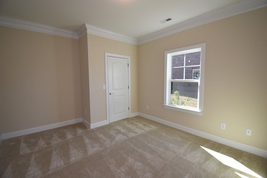Representative unfurnished interior of a home built from the Cosmopolitan by Keystone Homes NC in Weybridge, Burlington (Image 22).