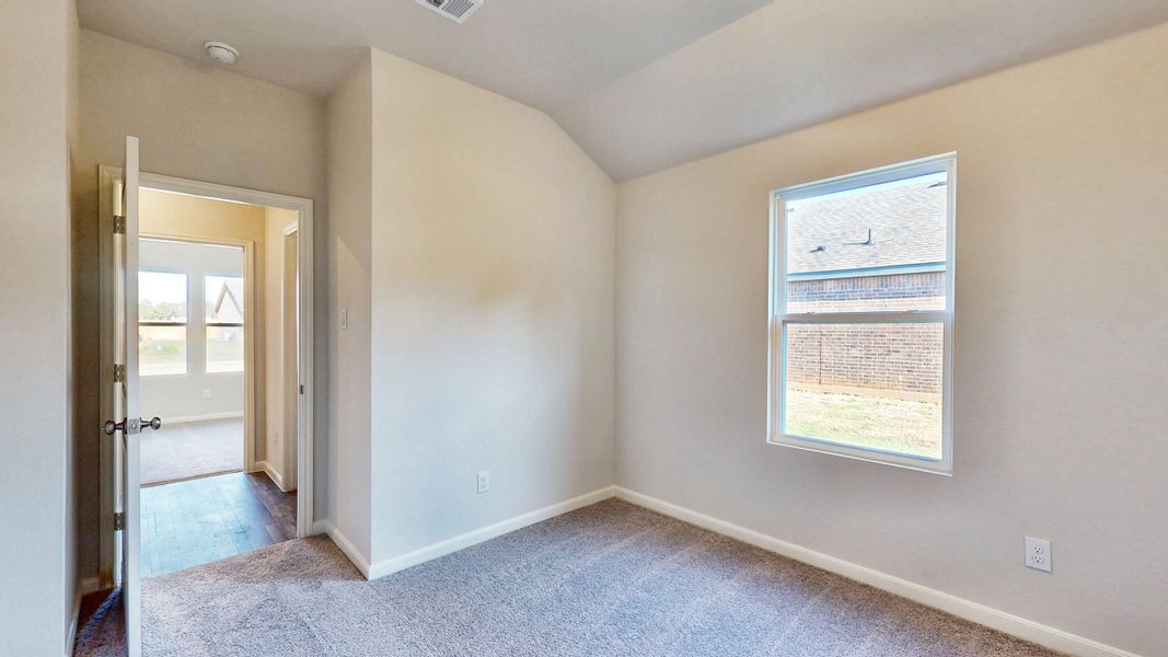 A room with a door and a window. A room with a door and a window.