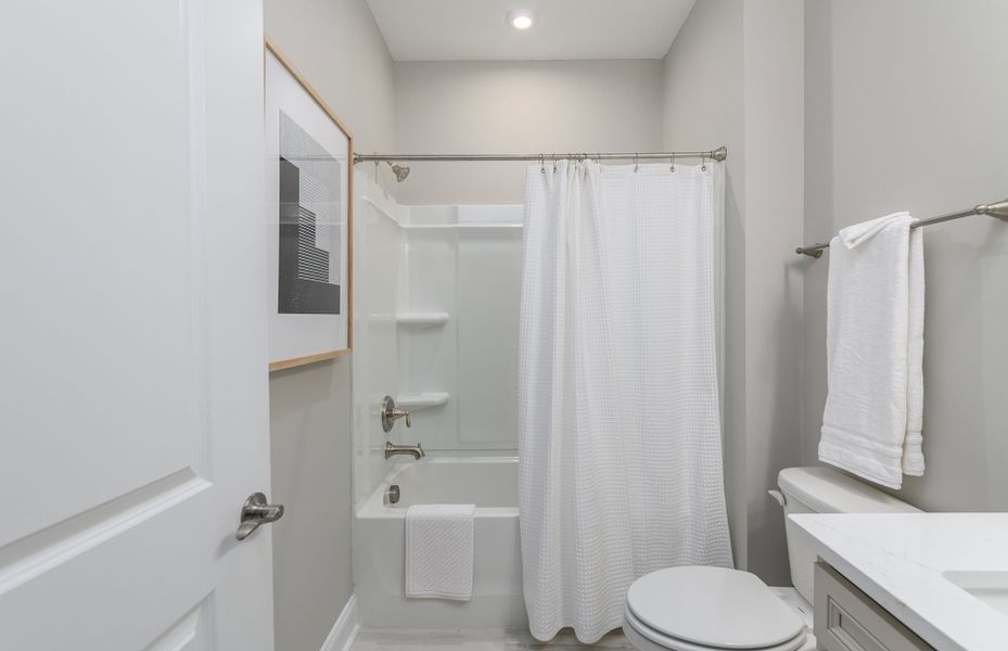 Guest bath with a soaking tub.