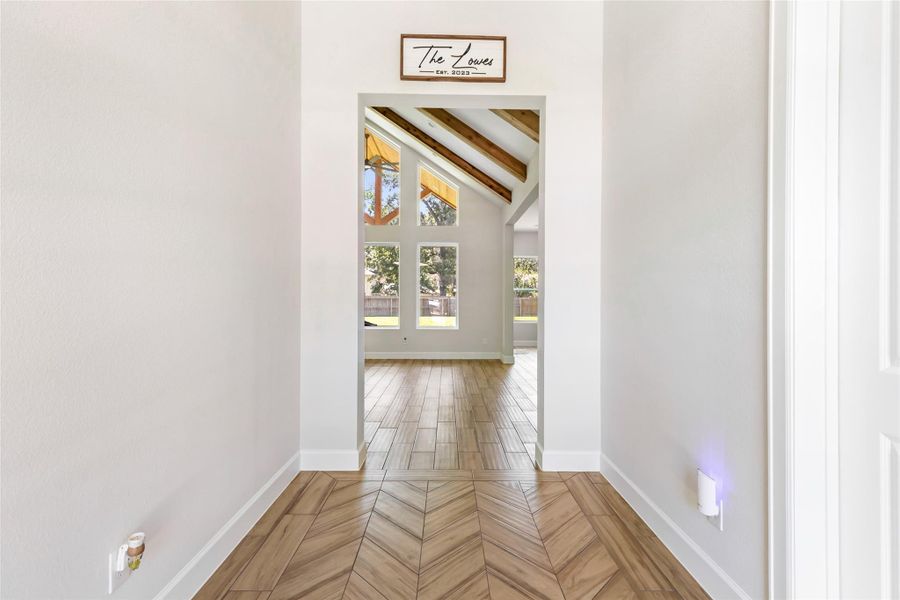 Foyer featuring Herringbone Tile Pattern