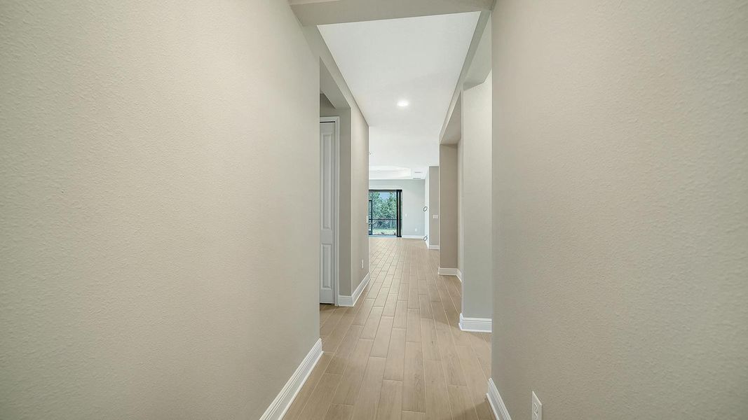 Spacious, unfurnished interior of a new home in Vicenza Real Estate and Homes for Sale in North Venice, FL - Neal Communities, Venice (Image 17).