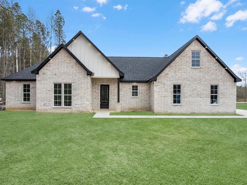 Step into this charming modern farmhouse with its inviting white brick exterior. The oversized windows, under soffit lighting add both style and functionality to this beauty!