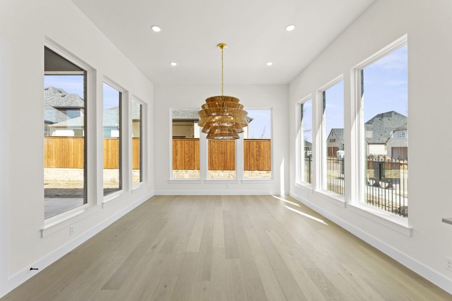 Representative unfurnished interior of a home built from the 5551 by Tradition Homes in Windsong Ranch, Prosper (Image 24).
