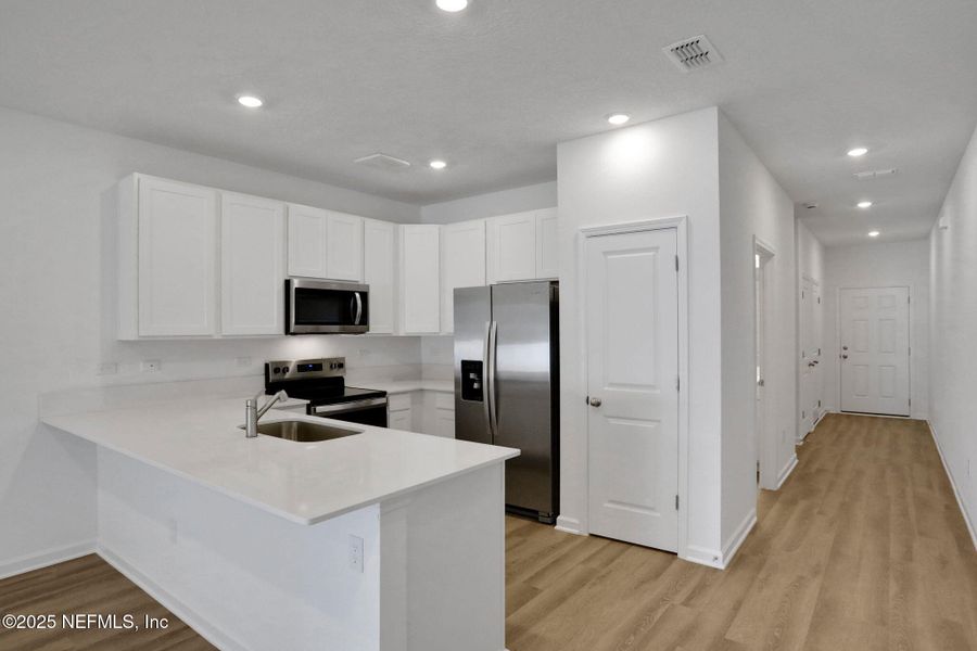 Furnished interior view inside a new home in , Jacksonville (Image 8).