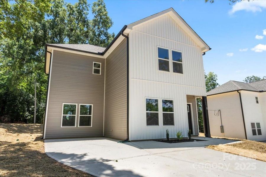 Front exterior of a new home in , Albemarle, NC, highlighting curb appeal (Image 1).