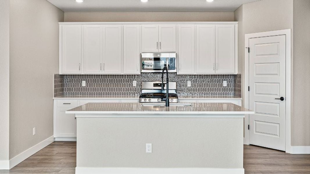 Representative furnished interior of a home built from the Pike by Taylor Morrison in The Aurora Highlands Town Collection, Aurora (Image 16).