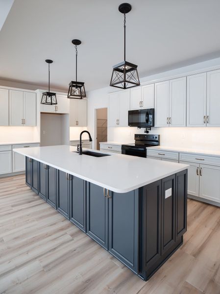 Representative furnished interior of a home built from the Harrison by Keystone Custom Homes in Edgewater on Lake Tillery, Norwood (Image 5).