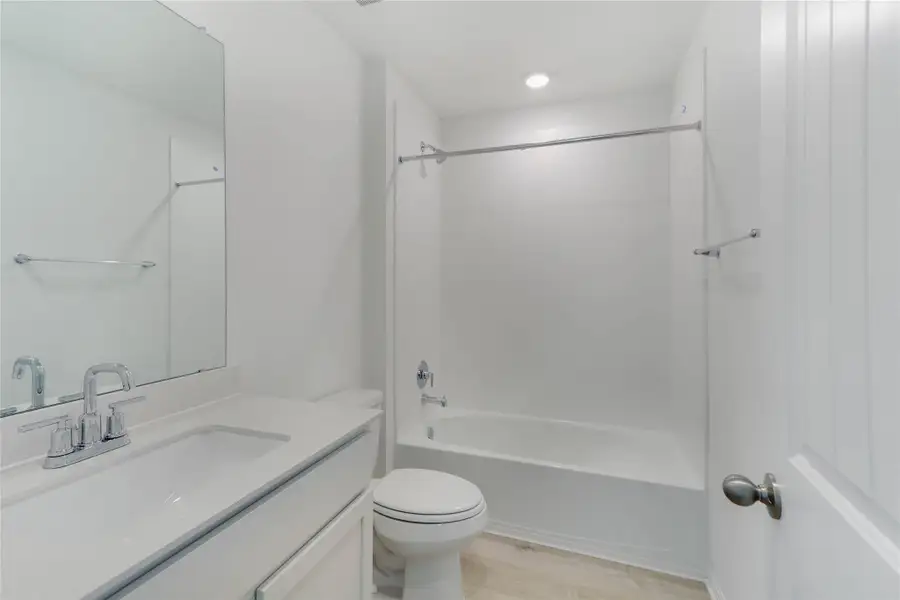 Furnished interior view inside a new home in Bar W Ranch, Leander (Image 8). Furnished interior view inside a new home in Bar W Ranch, Leander (Image 8).