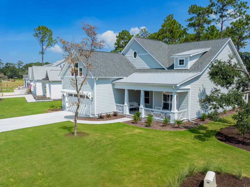 Front exterior of a new home in Osprey Landing, Southport, NC, highlighting curb appeal (Image 22).