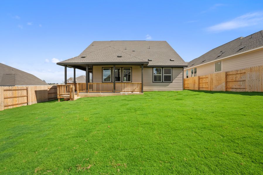 Representative exterior photo of a completed home built from the Texoma by Ashton Woods in The Colony 50s, Bastrop, TX (Image 20).