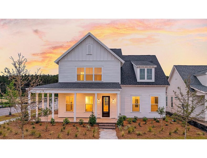 Front exterior of a new home in Midtown at Nexton, Summerville, SC, highlighting curb appeal (Image 2). Front exterior of a new home in Midtown at Nexton, Summerville, SC, highlighting curb appeal (Image 2).