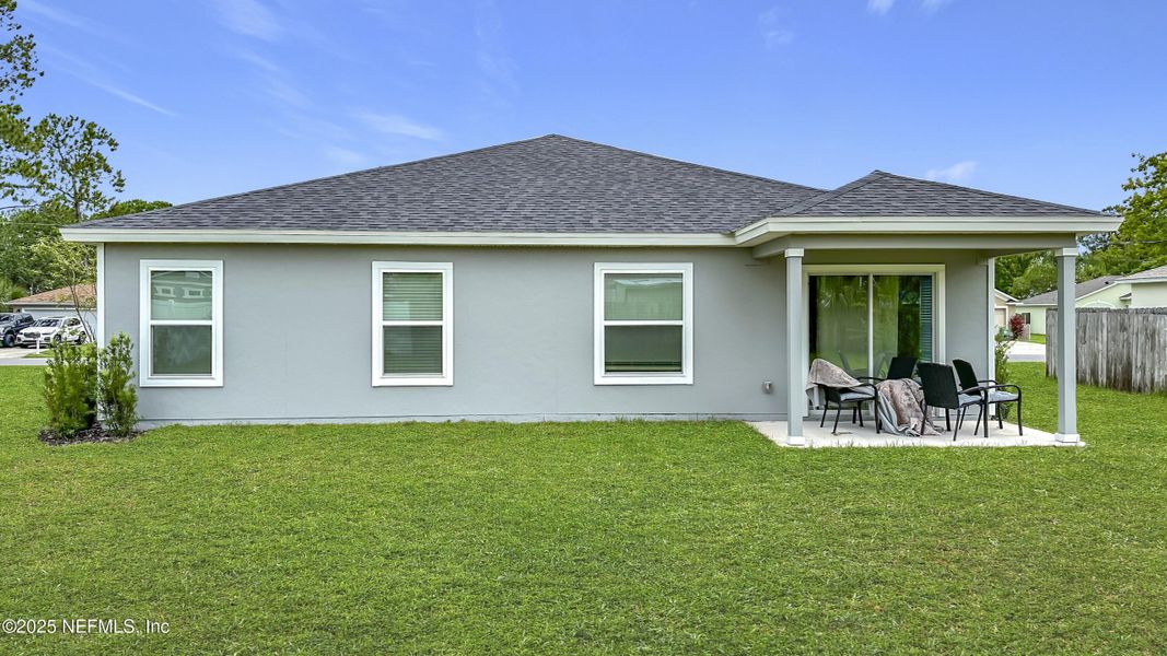 Front exterior of a new home in , Palm Coast, FL, highlighting curb appeal (Image 2). Front exterior of a new home in , Palm Coast, FL, highlighting curb appeal (Image 2).