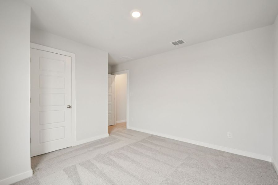 A room with white doors.