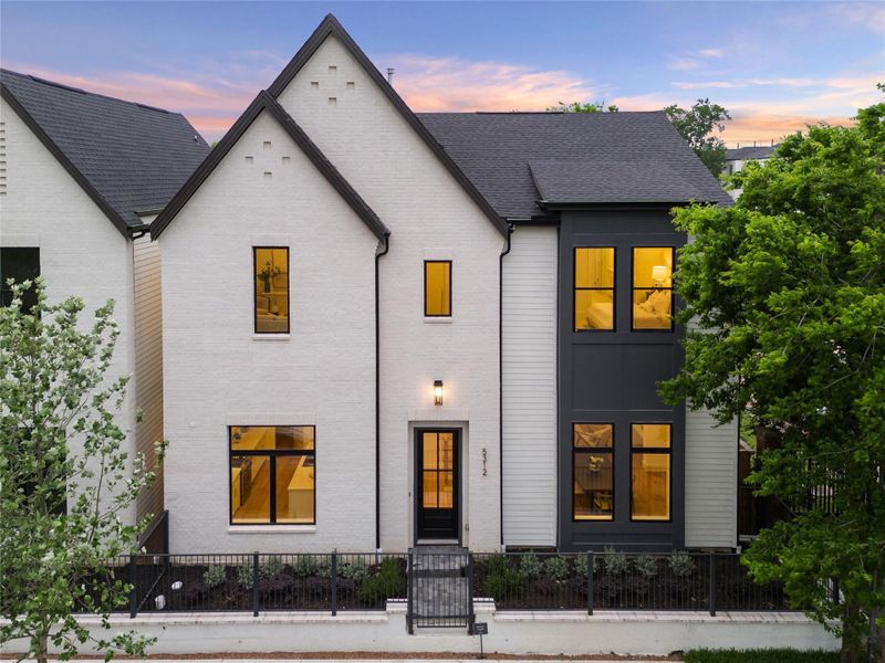 Exceptional Curb Appeal - This home comes with a well-proportioned handsome elevation. Elegant combination of hand slurred brick, painted carriage style garage door with a terracotta paver driveway. Exceptional Curb Appeal - This home comes with a well-proportioned handsome elevation. Elegant combination of hand slurred brick, painted carriage style garage door with a terracotta paver driveway.